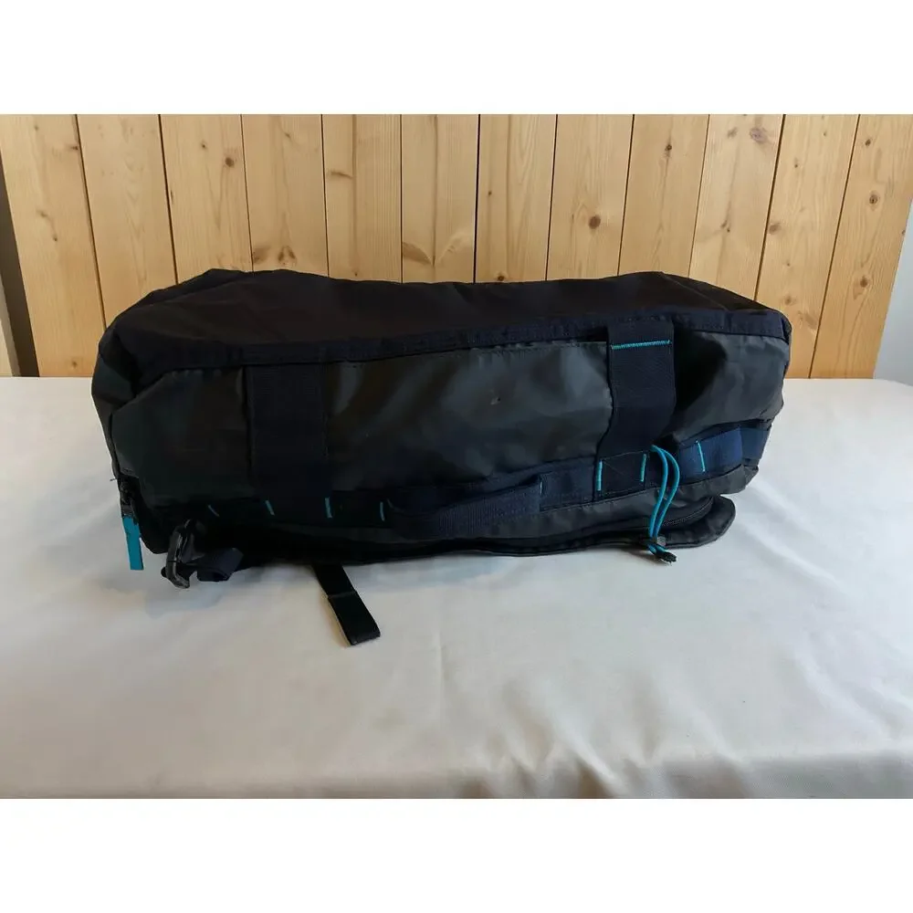 The North Face Base Camp Voyager 32L- Black with teal accent